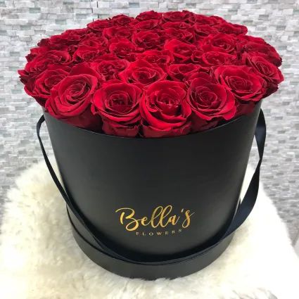 LARGE ROUND BOX ROSES THAT LAST A YEAR,