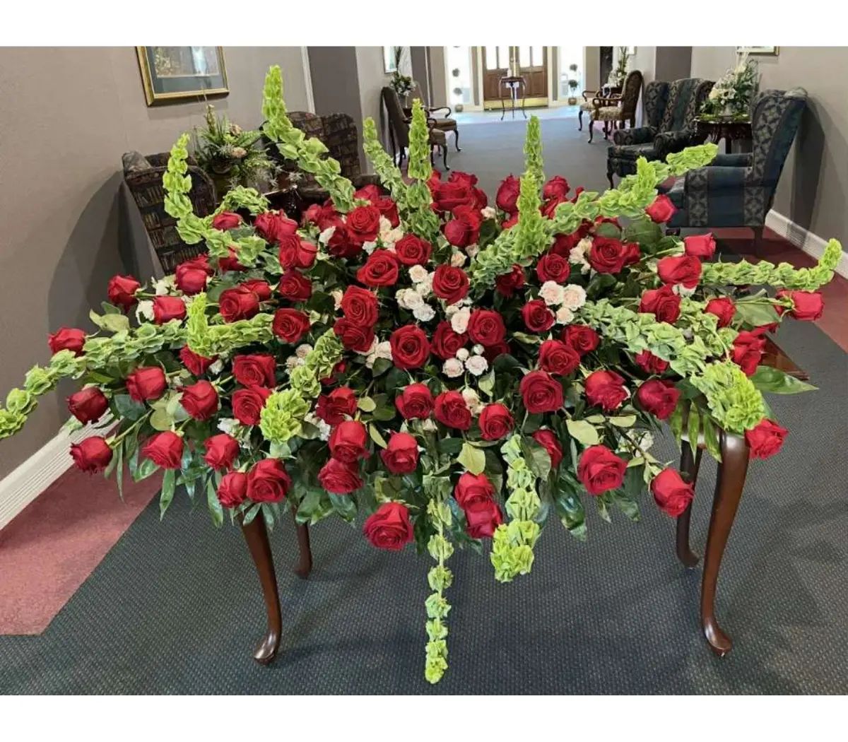 Roses and Baby's Breath Casket Spray