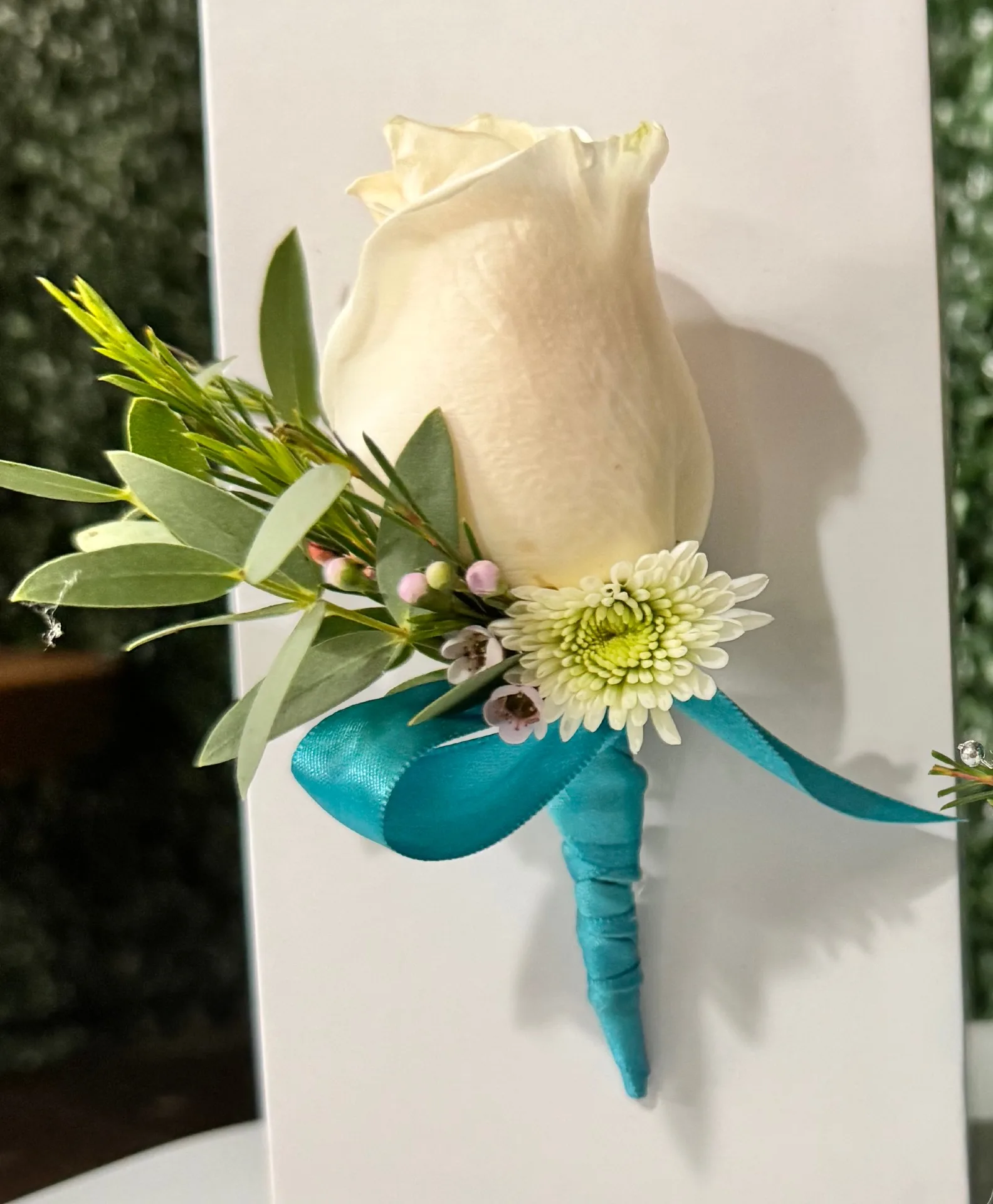 agua blue boutonniere agua blue boutonniere