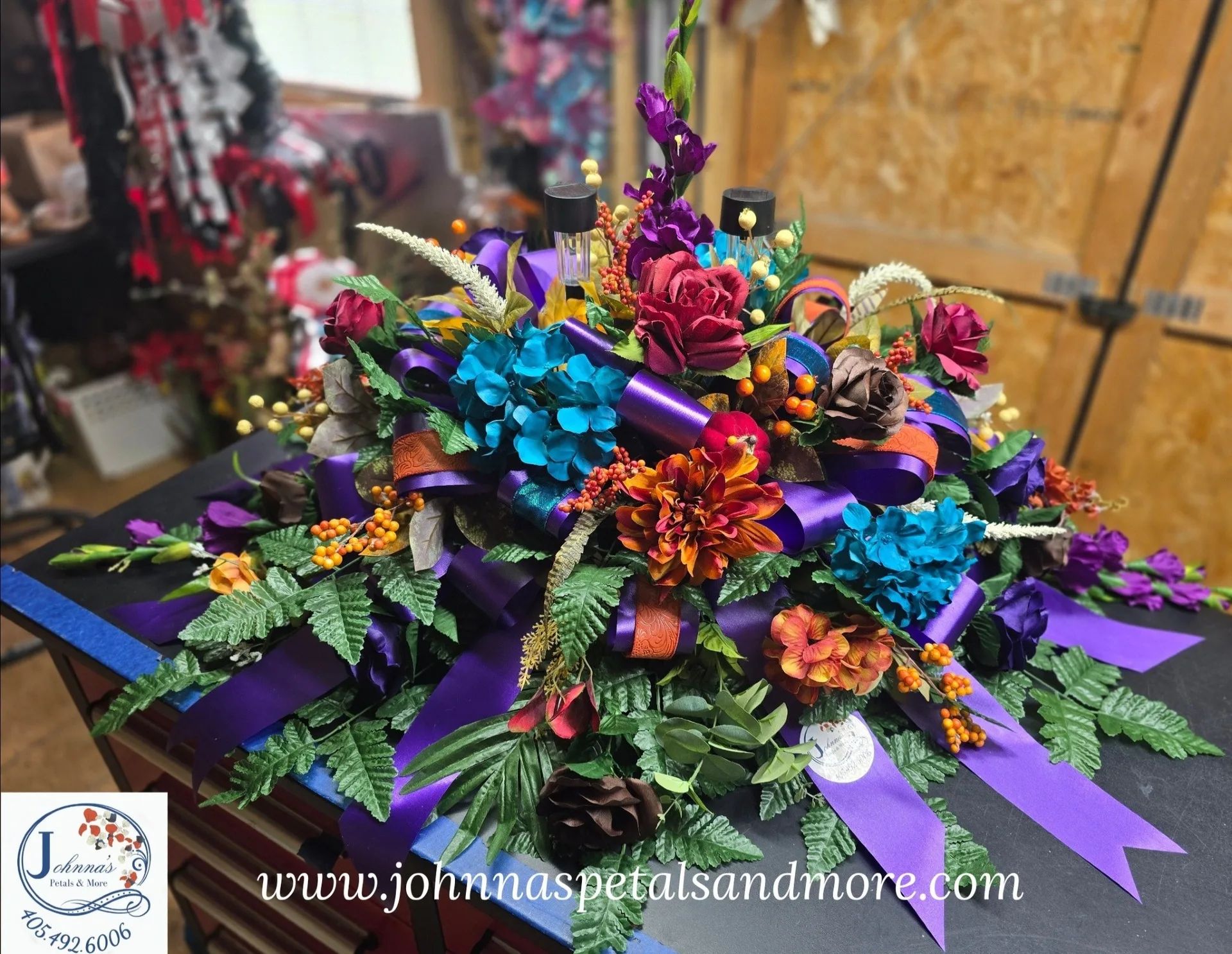'Mary Lou' Silk Spray on brick with 2 solar lights Silk Arrangement