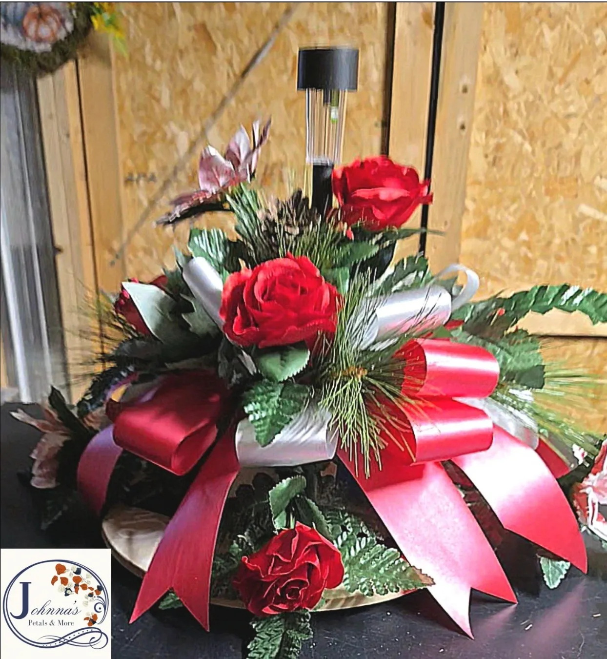 Silk Christmas Spray On A Brick With Solar Light Silk Arrangement Silk Christmas Spray On A Brick With Solar Light Silk Arrangement