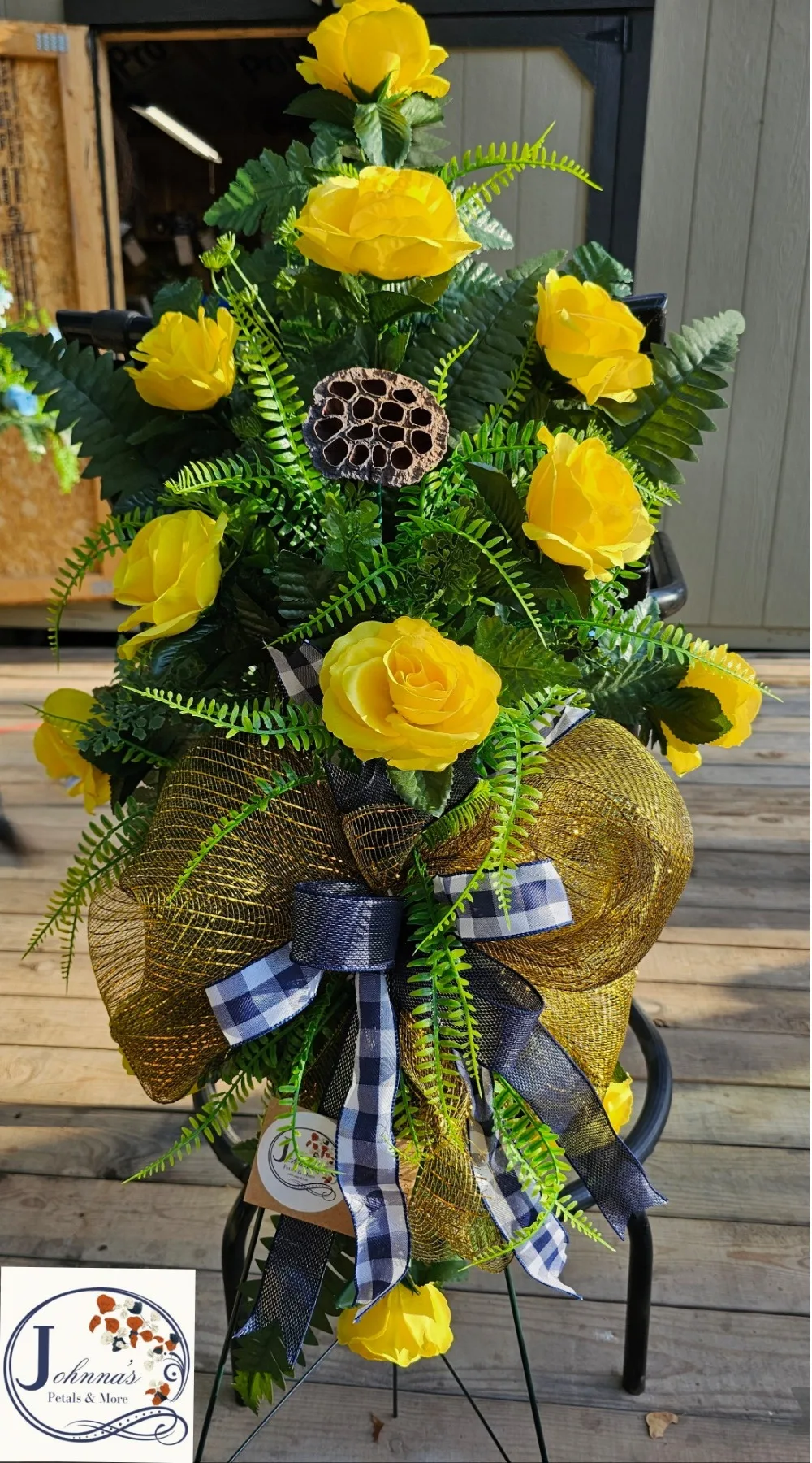 Silk Yellow Rose spray with blue accents on easel Silk Yellow Rose spray with blue accents on easel