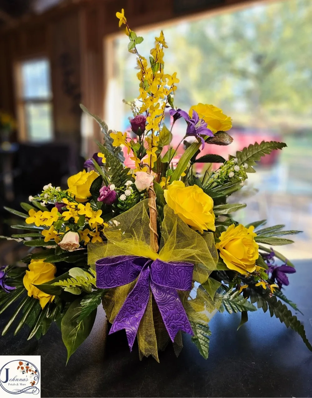 Silk basket arrangement of purples and yellows Silk basket arrangement of purples and yellows