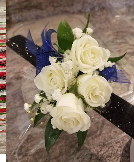 Royal white wrist corsage