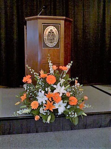 Orange and white arrangement Podium arrangement Orange and white arrangement Podium arrangement