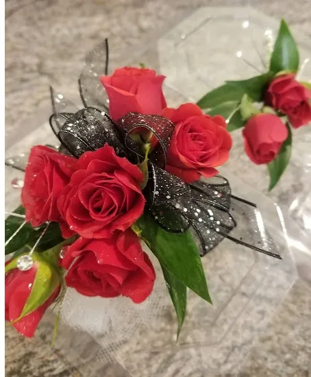 Ritzy red wrist corsage Ritzy red wrist corsage