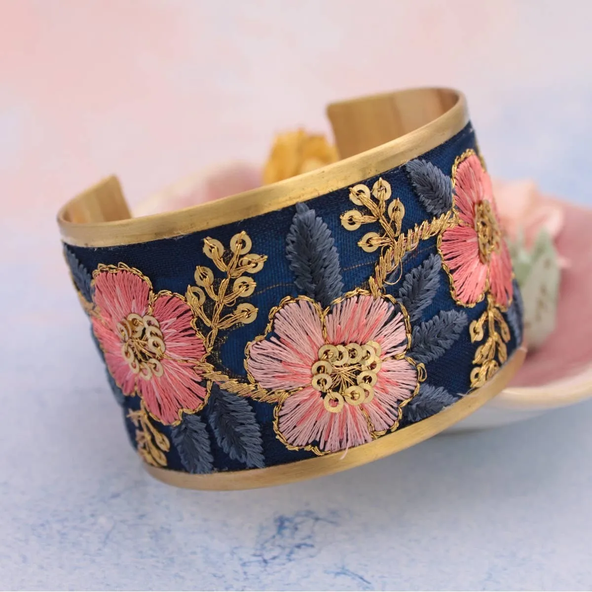 Navy and peach embroidered cuff bracelet Navy and peach embroidered cuff bracelet