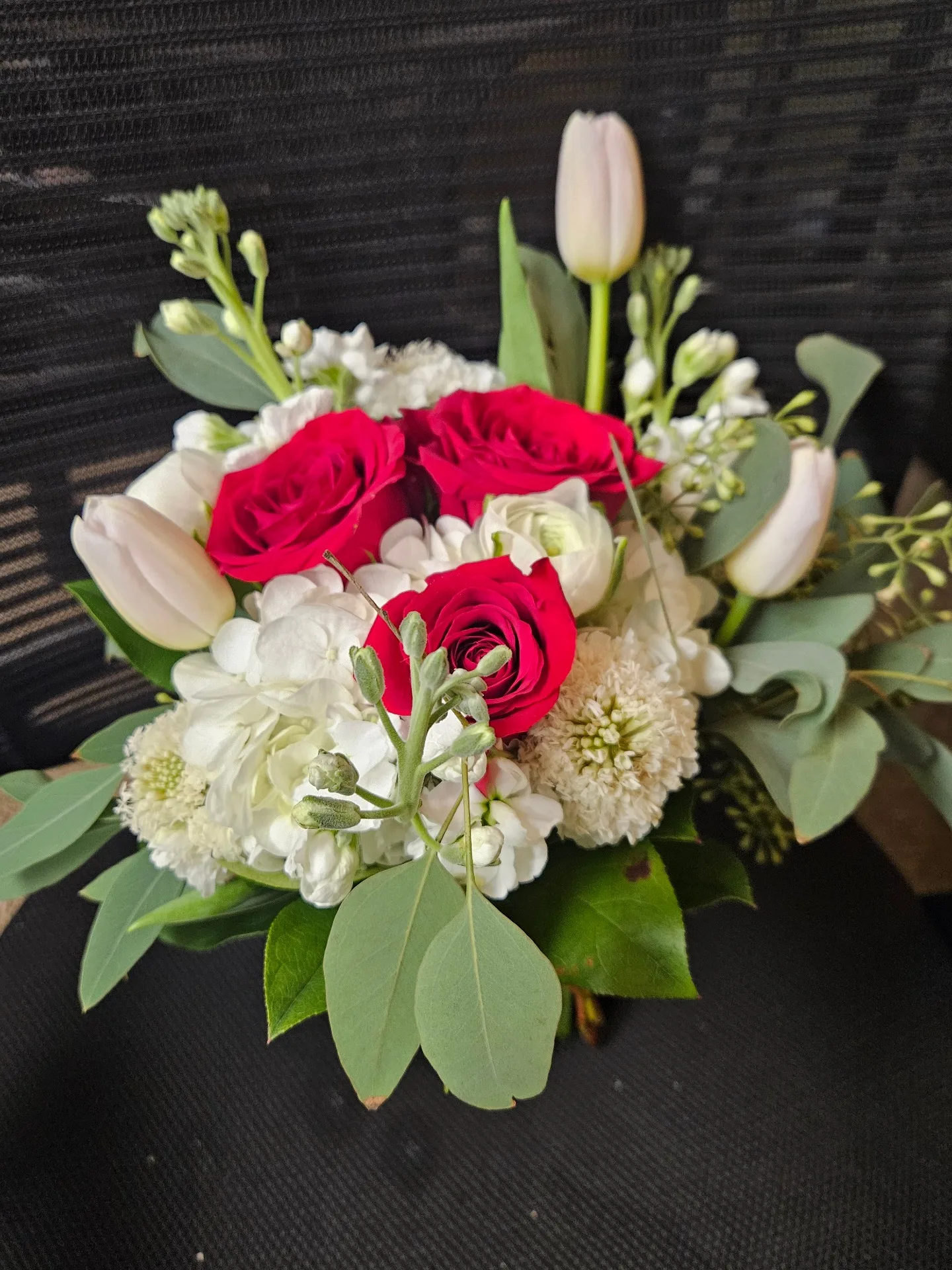 White with a "touch" of red Prom bouquet White with a "touch" of red Prom bouquet