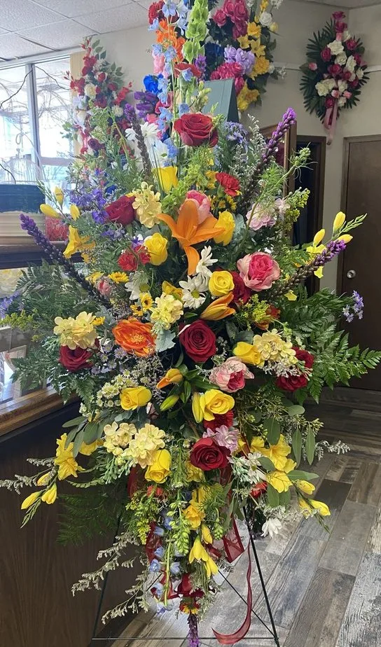 Standing Easel Spray in mixed fresh and silk flowers Standing Easel Spray in mixed fresh and silk flowers