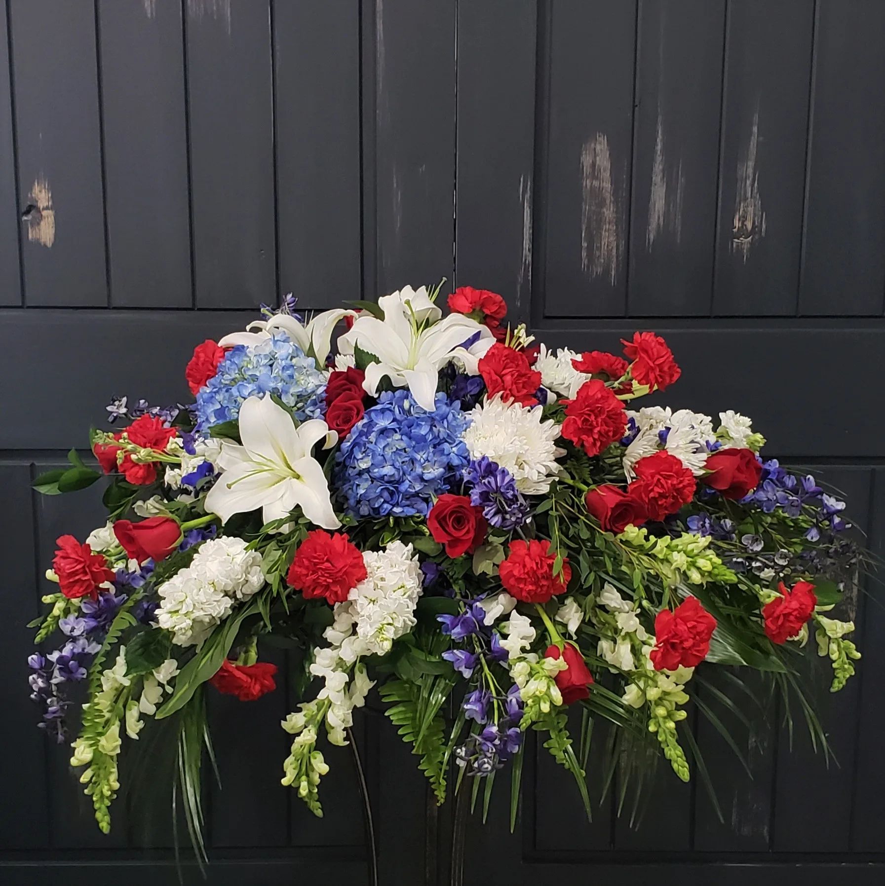 Patriotic Casket Spray for Mora MN