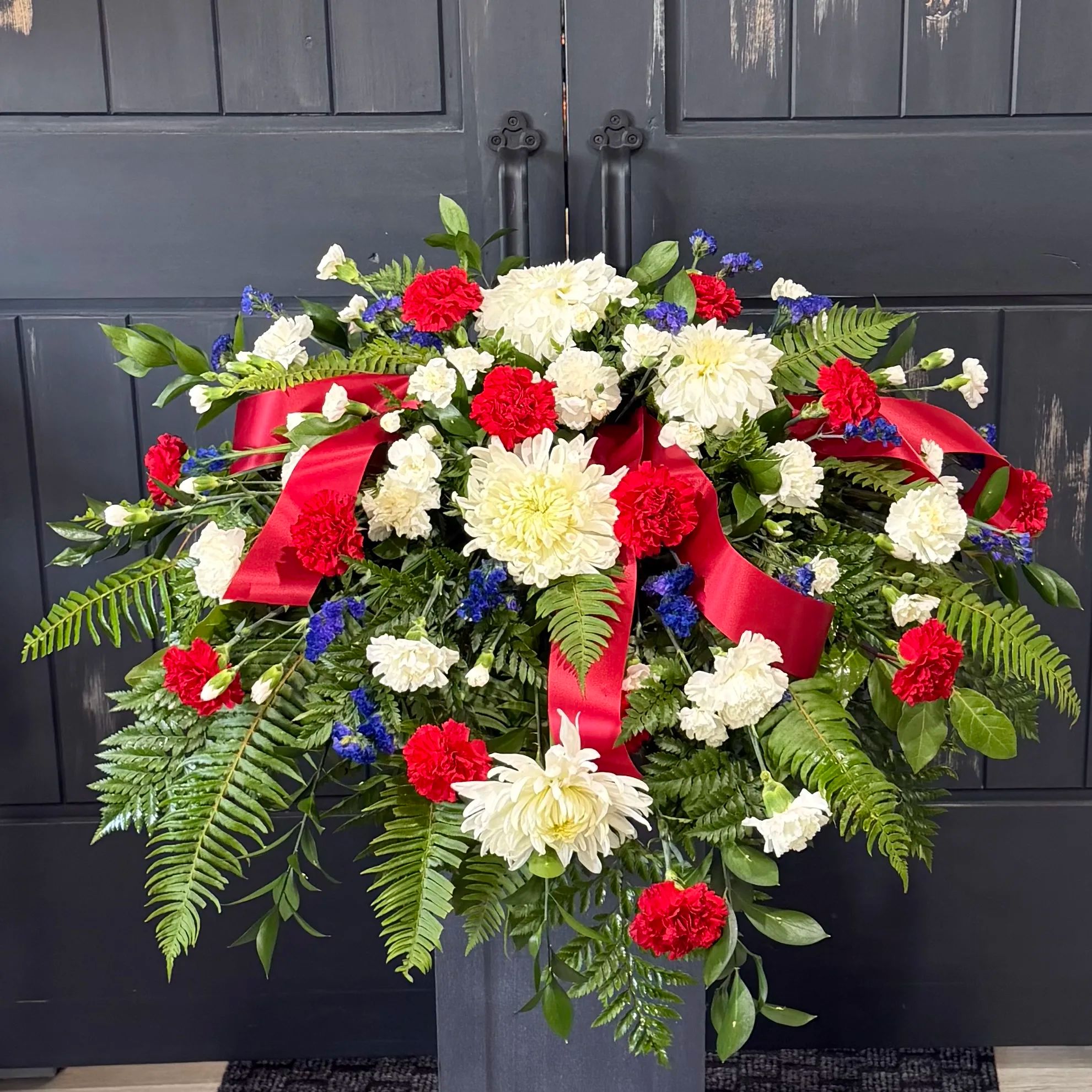 Patriotic Casket Spray for Mora MN