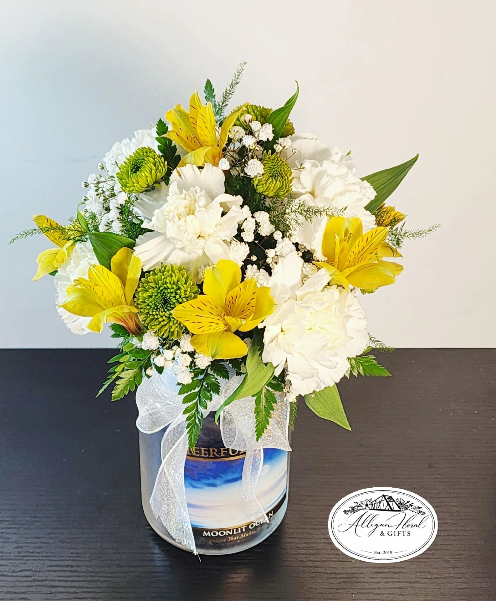 Cheerful Giver Long Lasting Flowers on a Candle. Cheerful Giver Long Lasting Flowers on a Candle.