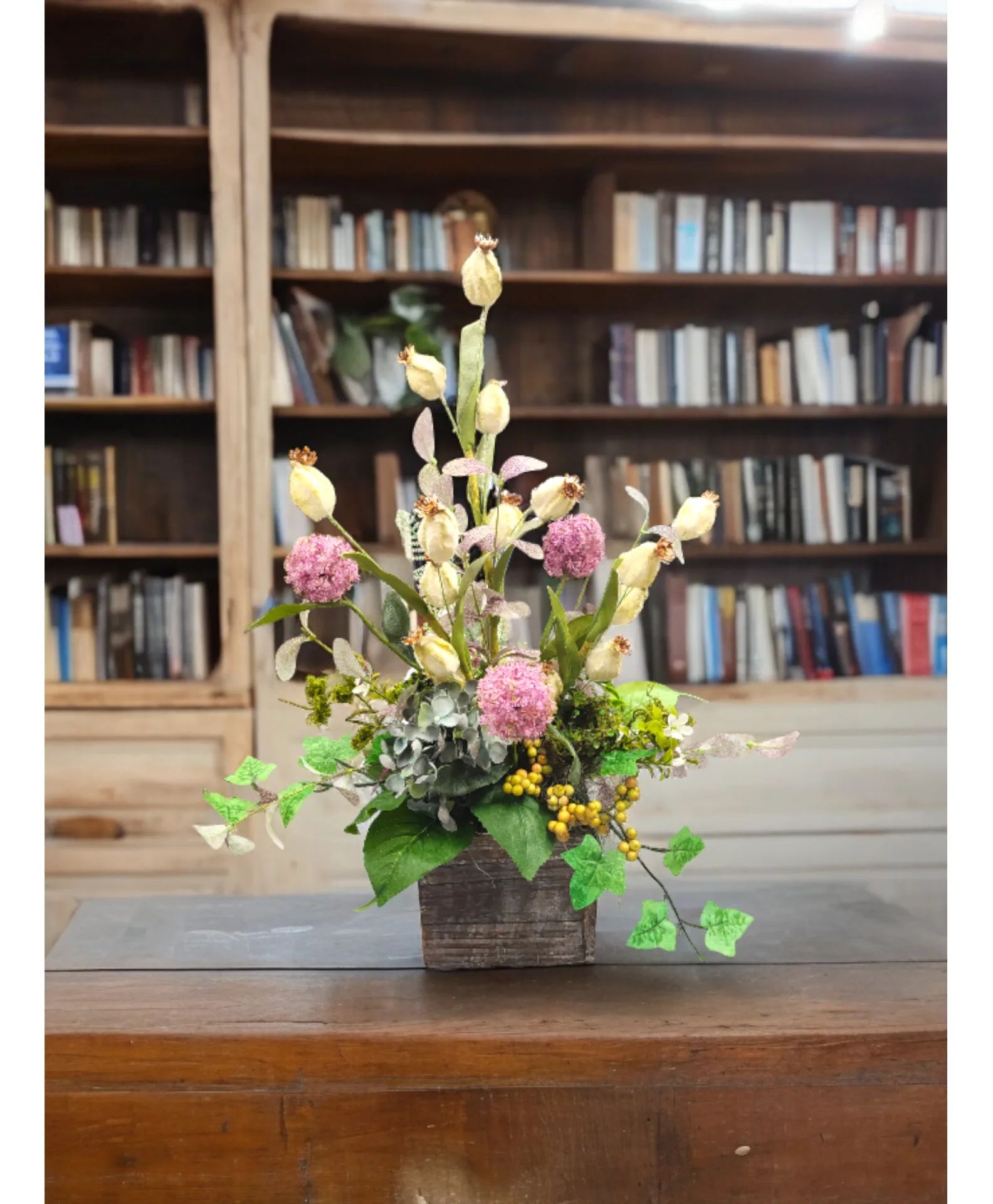 Natural with a pop of purple Permanant Arrangement