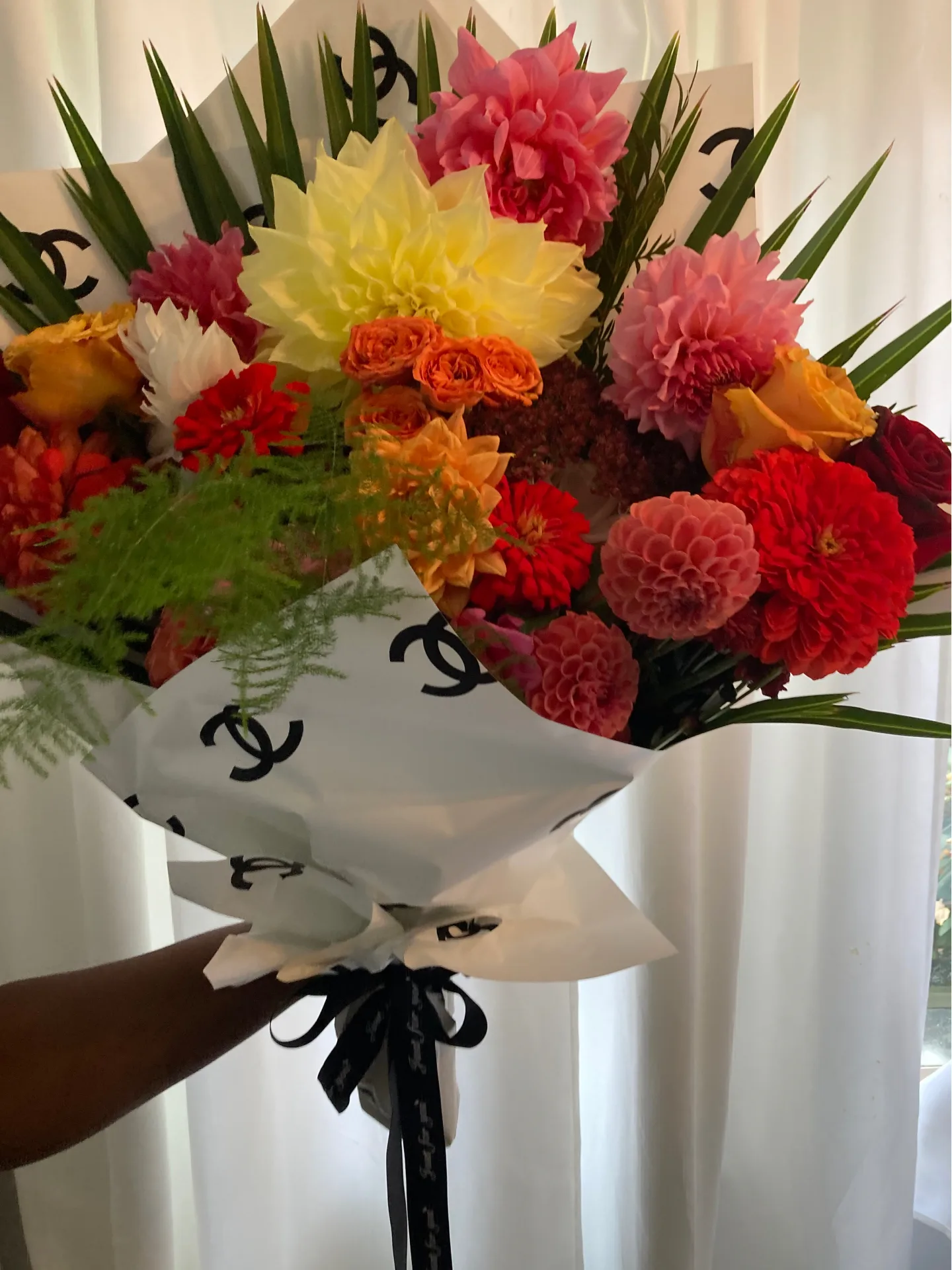 HAND TIED BOUQUET Wrapped Bouquet HAND TIED BOUQUET Wrapped Bouquet
