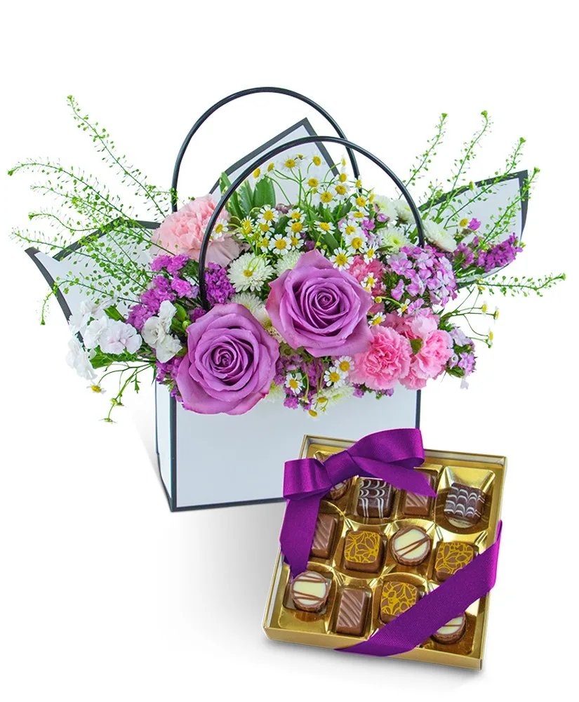 Roses and Chocolate Blooming Tote Ensemble Flower Arrangement Roses and Chocolate Blooming Tote Ensemble Flower Arrangement