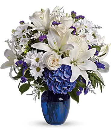 beautiful in blue vase arrangement beautiful in blue vase arrangement